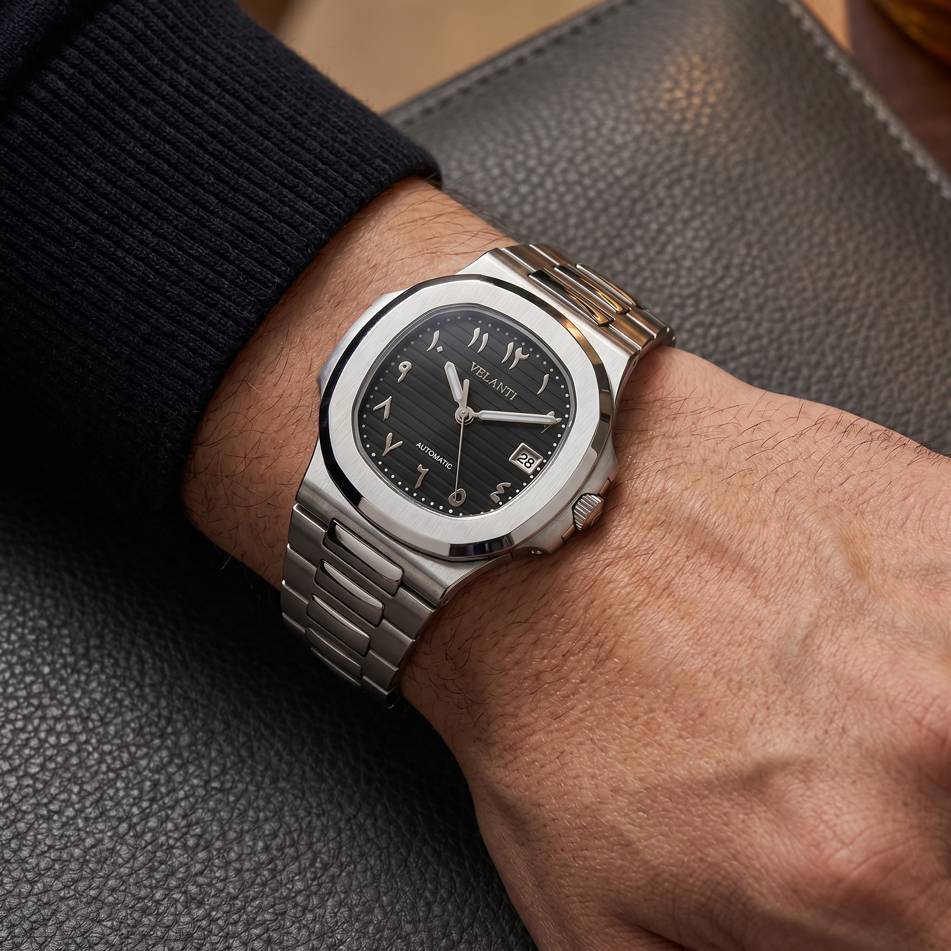 Nautilus-style custom mod watch, Velanti Milano Nautvel Arabic Black worn on wrist photo 2